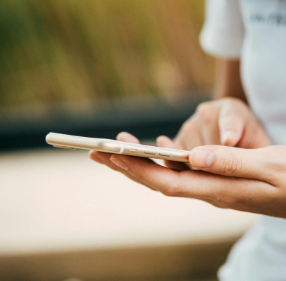 Mobile phone in a person's hand