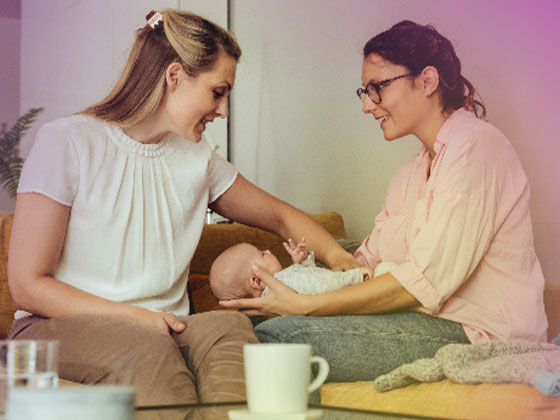 Two women and a baby